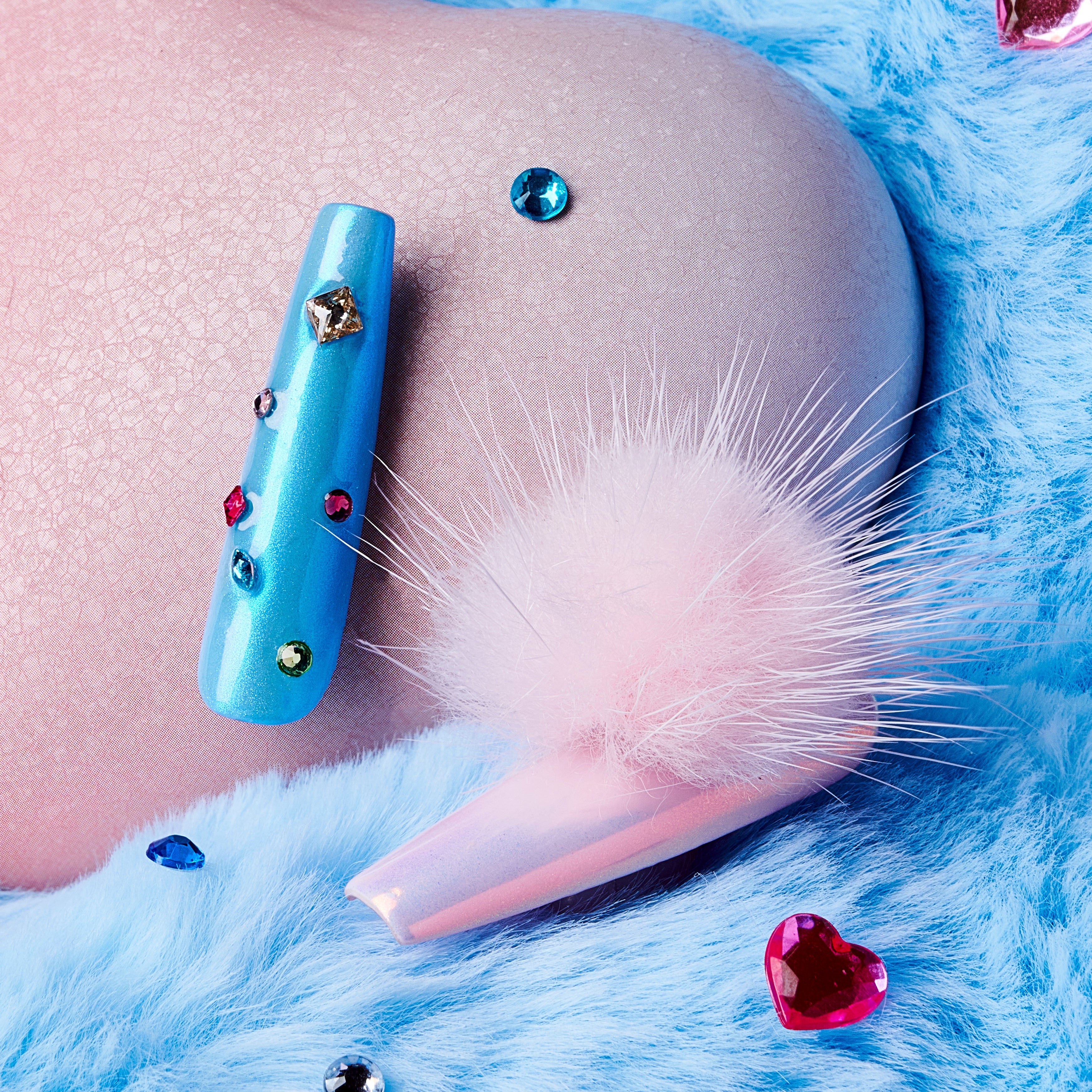 Barbie Stardream – Halloween press on nails with pink shimmer, candy-blue accents, rhinestones, and fluffy pom-poms