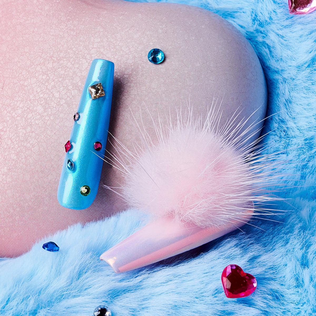 Barbie Stardream – Halloween press on nails with pink shimmer, candy-blue accents, rhinestones, and fluffy pom-poms