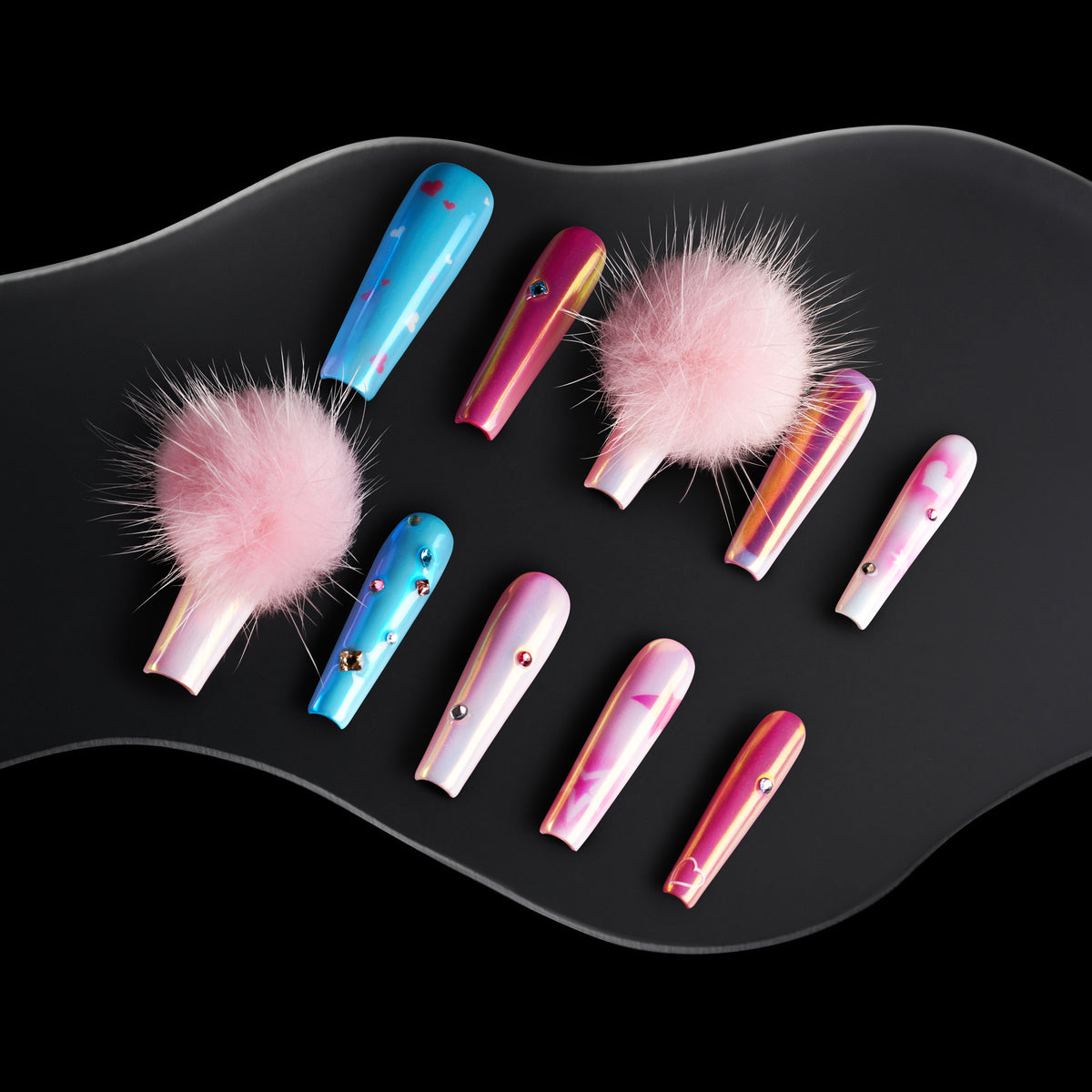 Barbie Stardream – Halloween press on nails with pink shimmer, candy-blue accents, rhinestones, and fluffy pom-poms