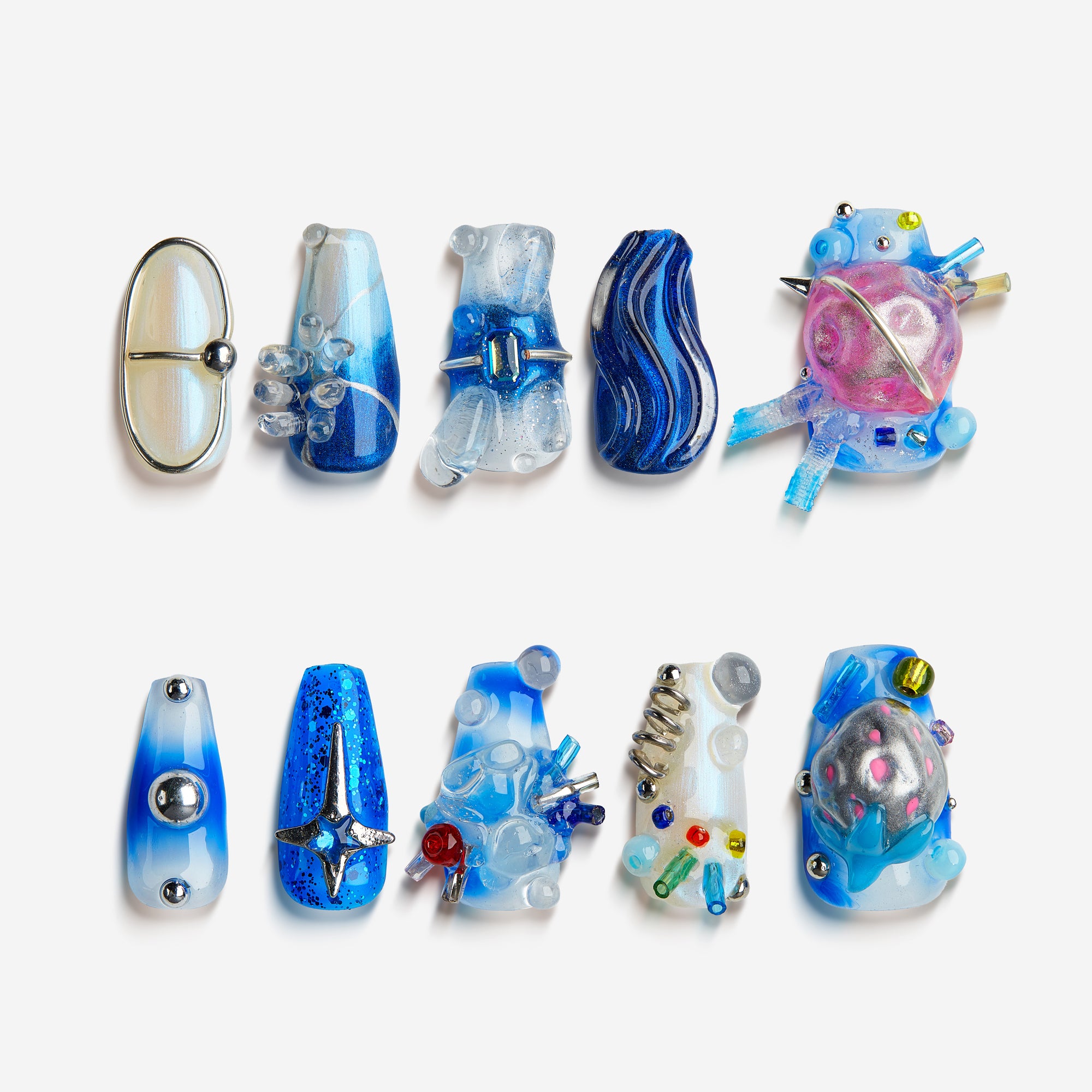 Aurora Wave Heart – futuristic press on nails in blue and silver with 3D galactic accents