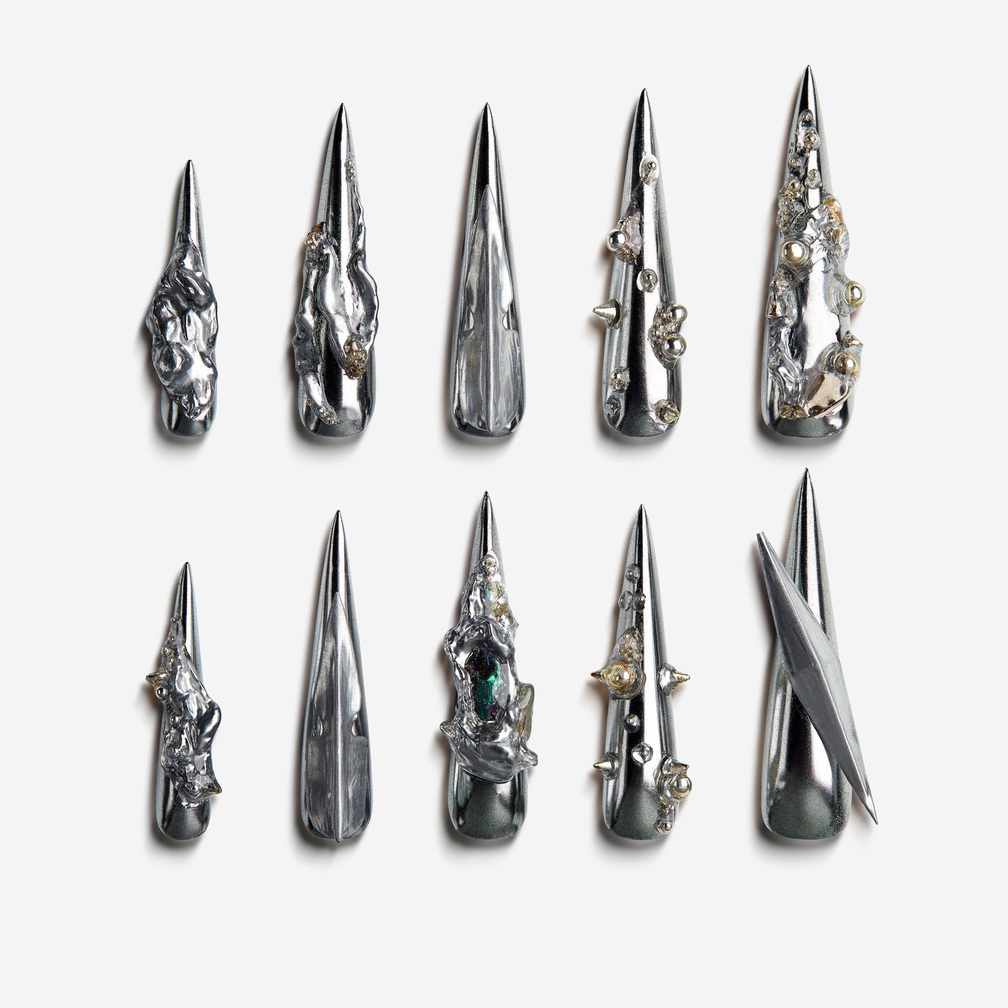 Blade Mirage – metallic silver press on nails with sculpted 3D textures and spikes