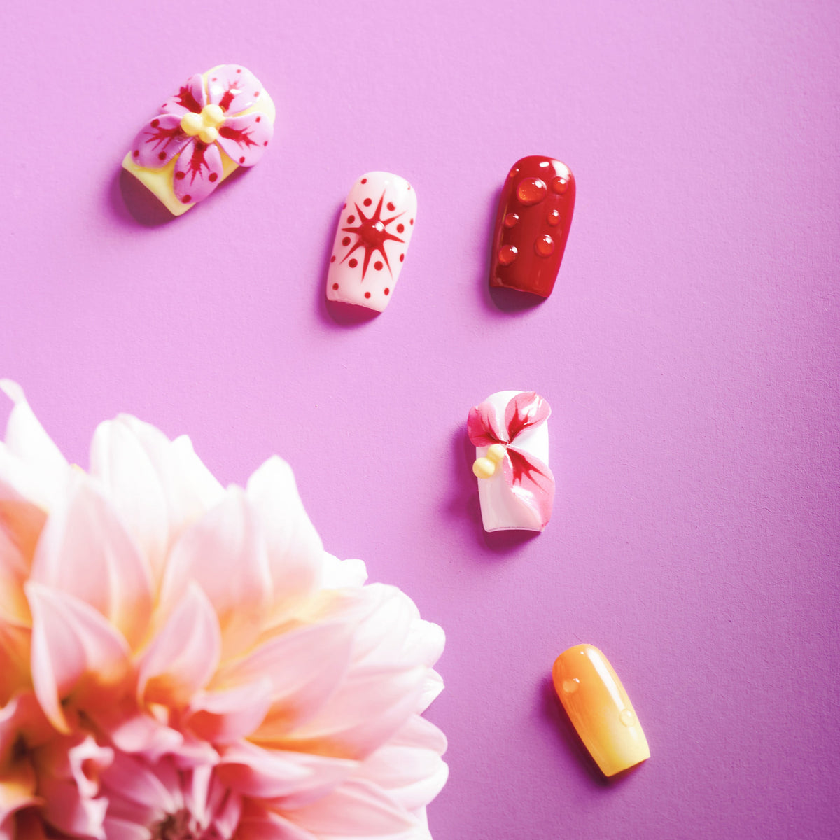 Petal Whisper – colorful press on nails with 3D flower accents, pastel gradients and dotted details