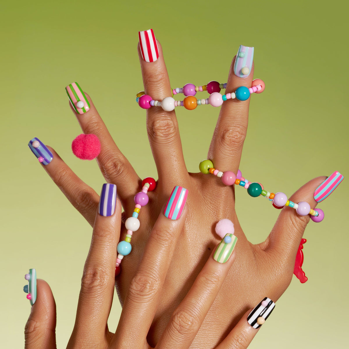 Playful Stripe – colorful striped press-on nails with 3D pastel dots