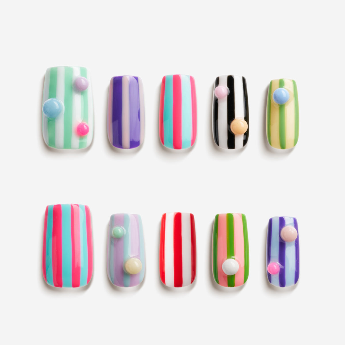 Playful Stripe – colorful striped press-on nails with 3D pastel dots
