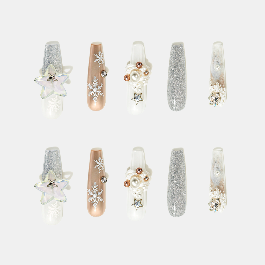 Snowland Gleam – silver and champagne press-on nails with pearls, glitter, and star accents for Christmas and New Year