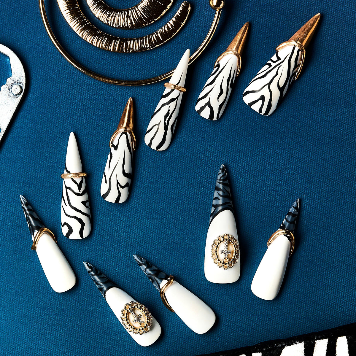 Striped Elegance long – long zebra stiletto press-on nails with gold ring design