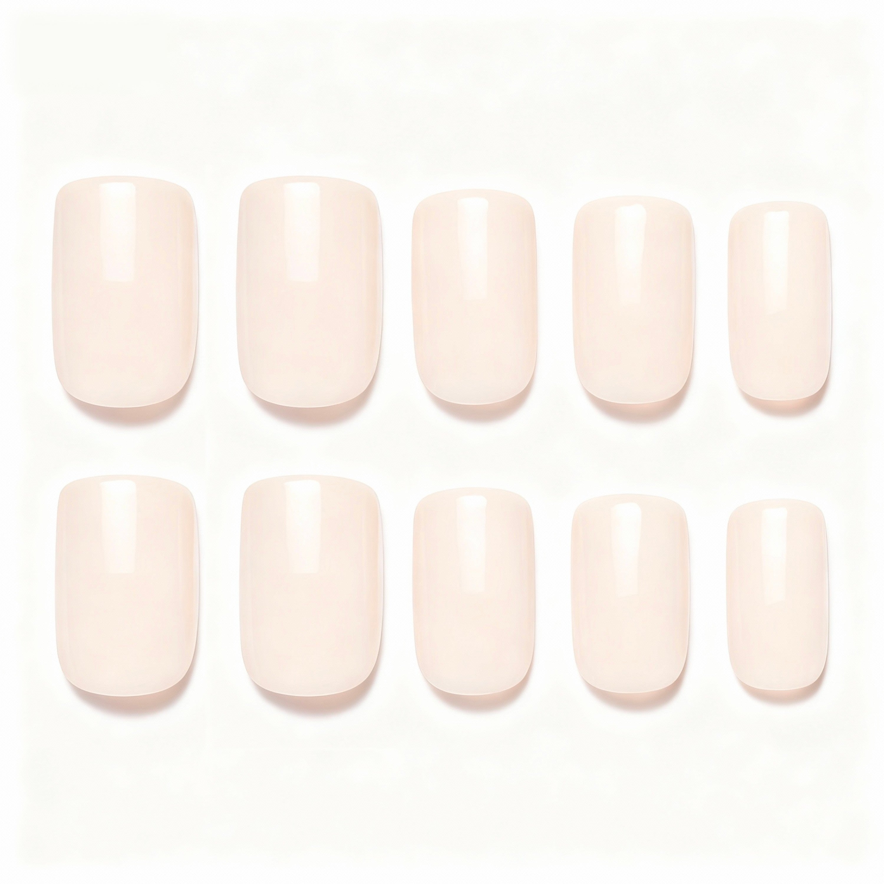dresup Subtle Sheen milky nude press on nails with soft glossy finish. Natural everyday false nails for office, bridal and minimalist looks.