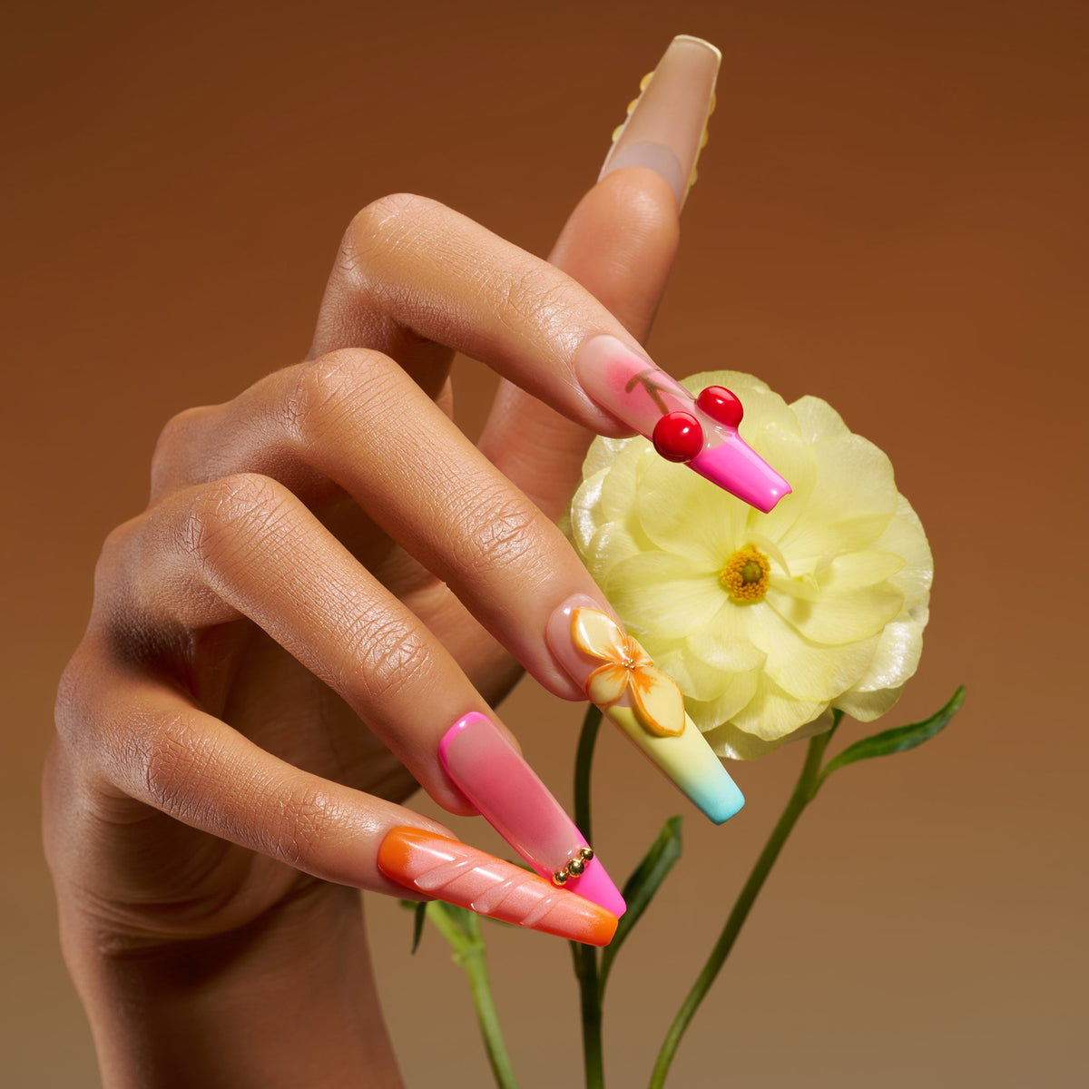 Sunset Cherry – fruity press on nails with cherry motifs, gradient sunset tones, and floral accents