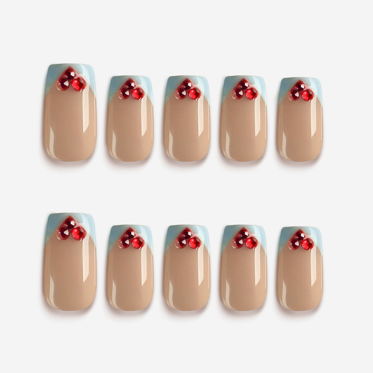 Sweet Heart Pink – nude and blue French tip press-on nails with red crystals