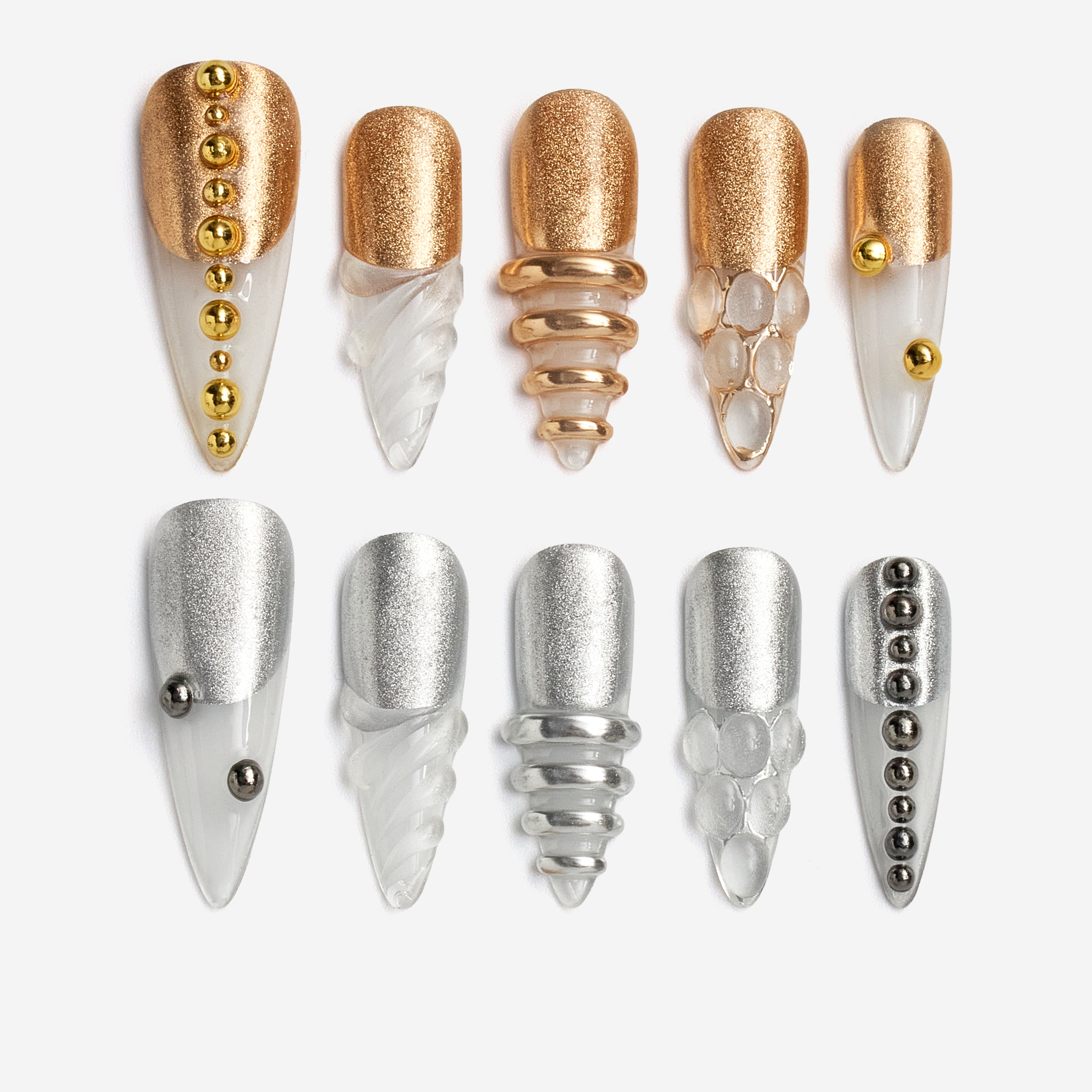 Dresup Metallic Wave press on nails with gold and silver chrome finish. Trendy metallic false nails.
