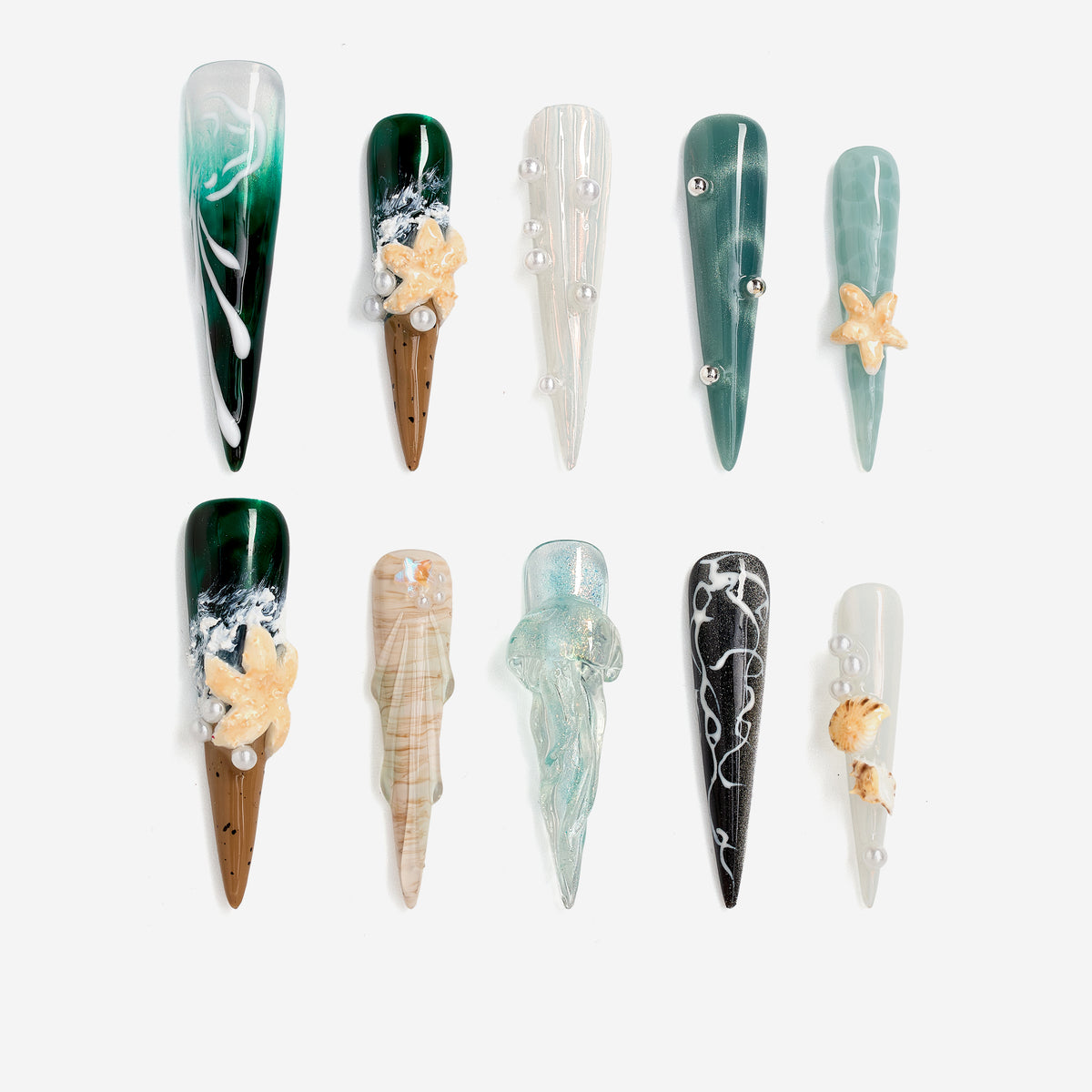 Dresup Ocean Mystique press on nails with green gradient and 3D sea elements. Statement stiletto false nails.