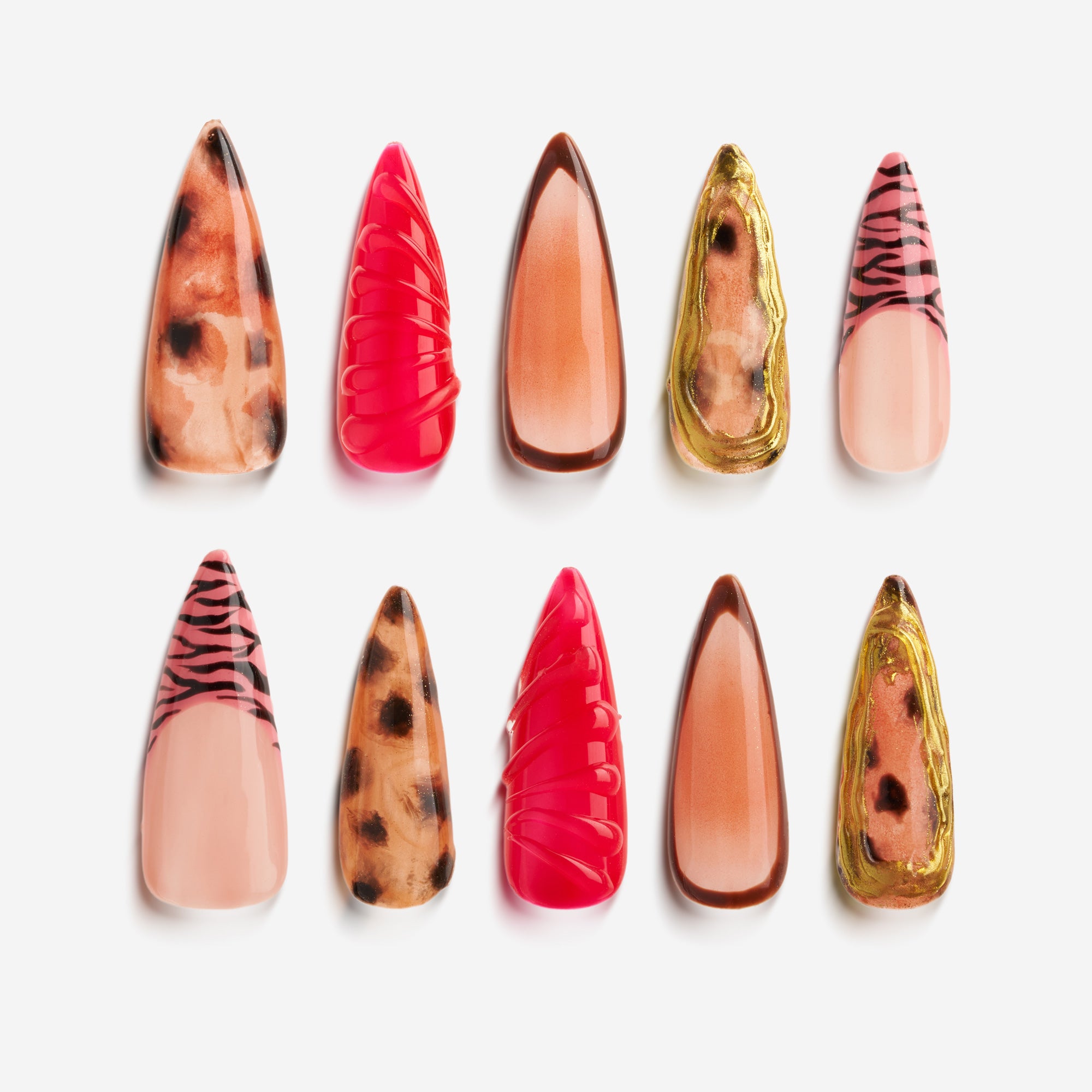 Fiery Flow press on nails with red marble, animal print, and gold-frame accents