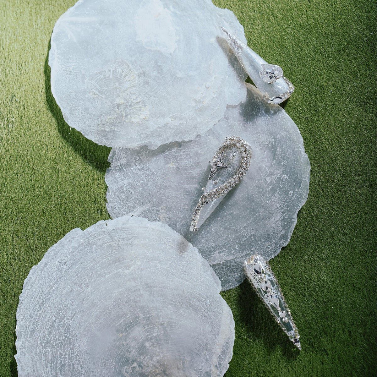 Silver and white glacier-inspired French press on nails with shimmer and icy texture