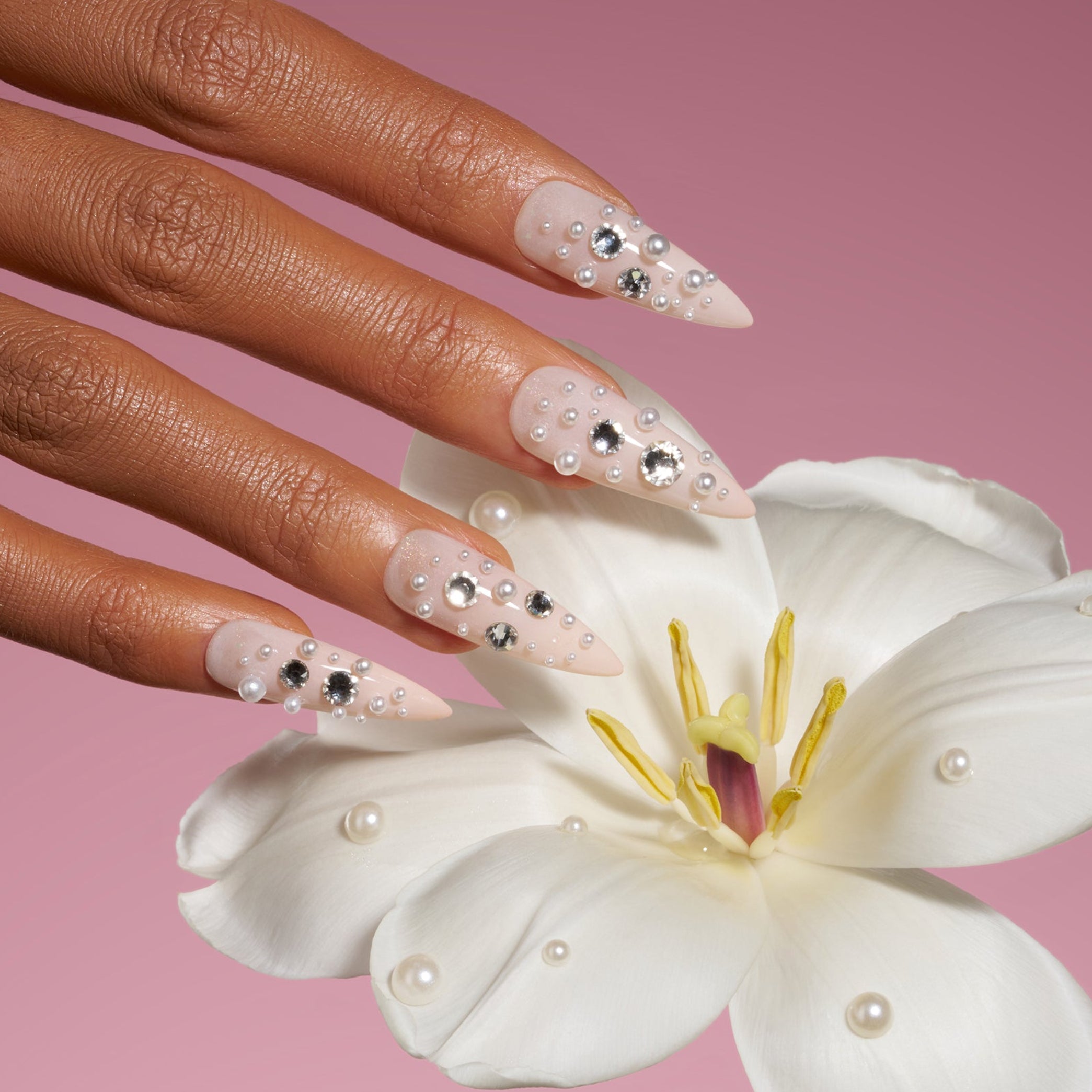 Nude press on nails with pearl and rhinestone clusters for soft luxury style