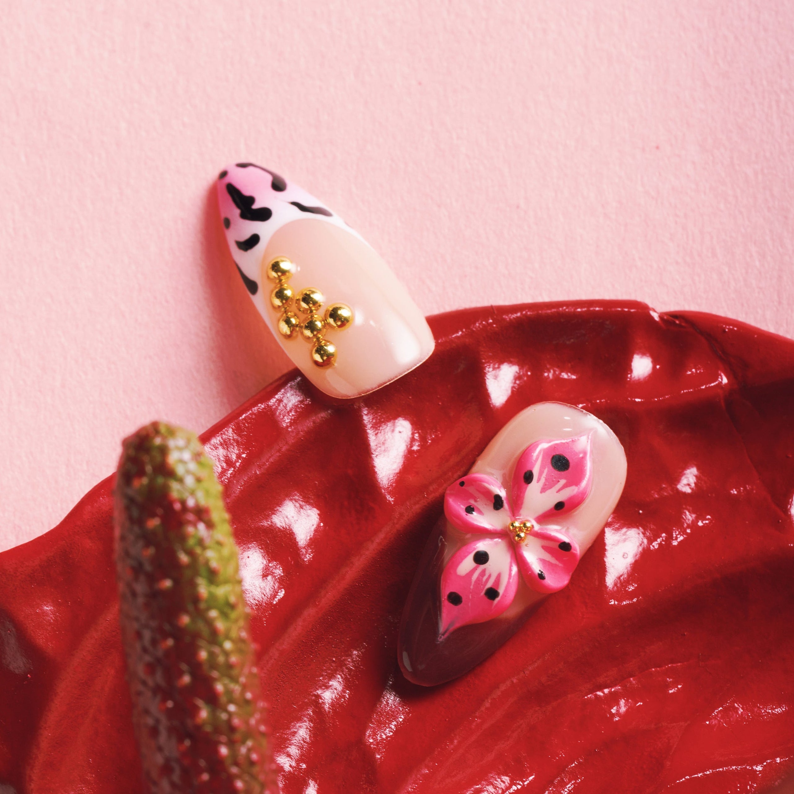 Nude and gold luxury press on nails with sculptural texture. Handmade reusable nail art set with modern elegance.