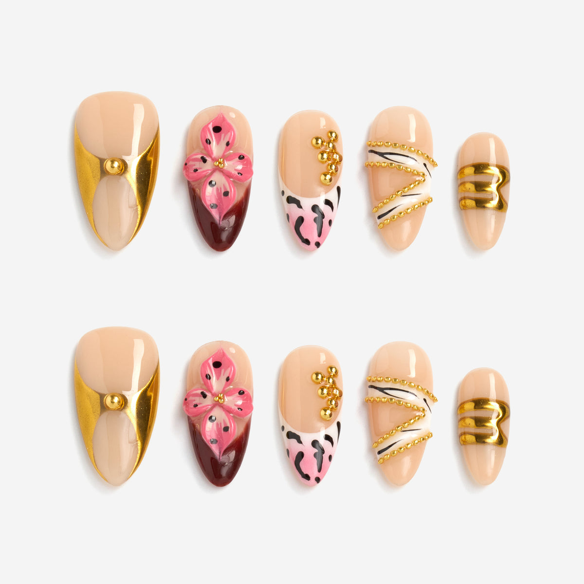 Nude and gold luxury press on nails with sculptural texture. Handmade reusable nail art set with modern elegance.
