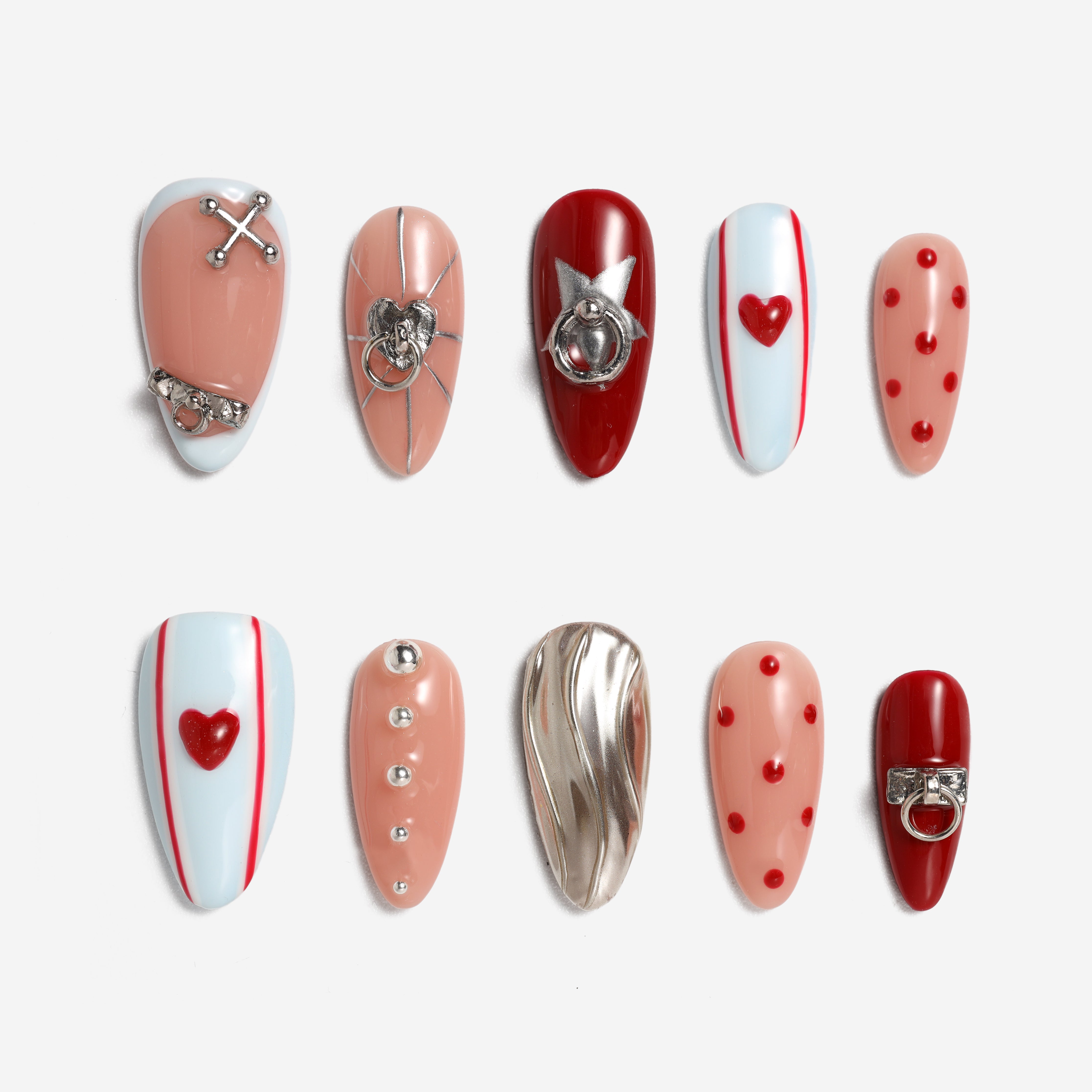 Modern heart press on nails with glossy red and metallic details. Trendy, reusable and eye-catching.