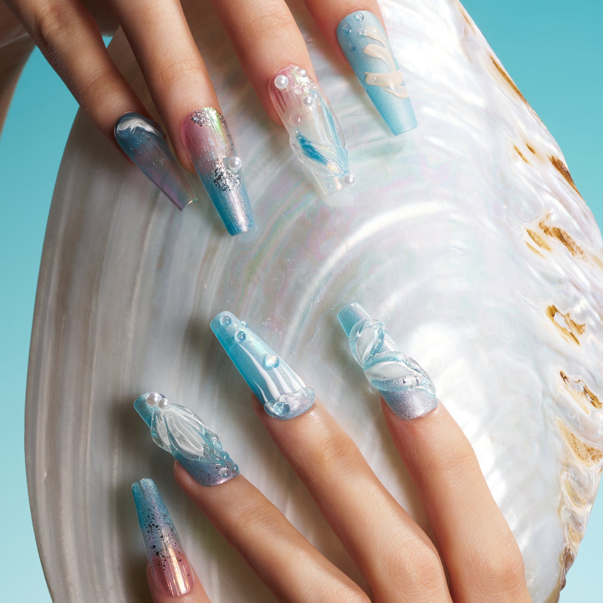 Ice Sea Fairy press-on nails with blue gradient, pearl accents, and 3D ocean-inspired textures
