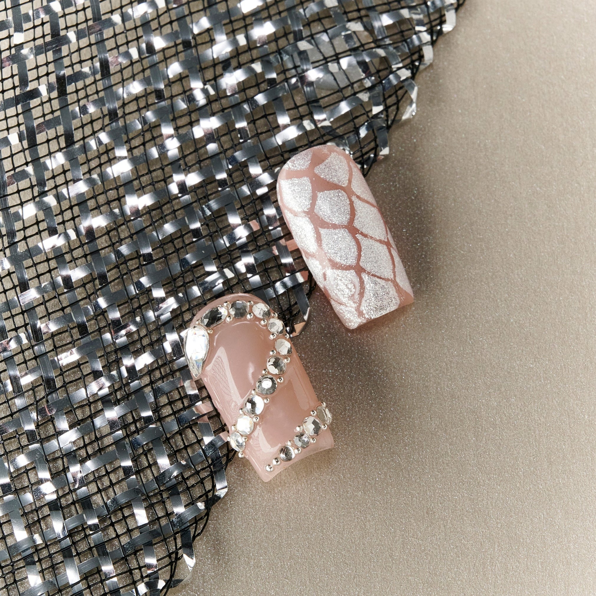 Elegant nude pink French press on nails with crystal accents. Minimal, glossy and reusable.