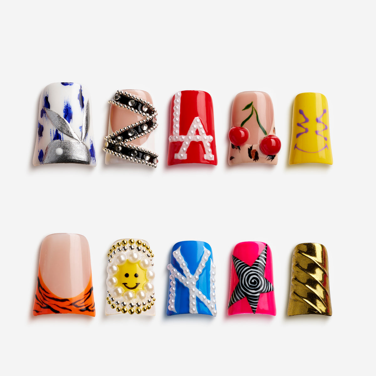 Modern Artbeat press on nails with mixed graffiti, pearls, symbols, and playful icons
