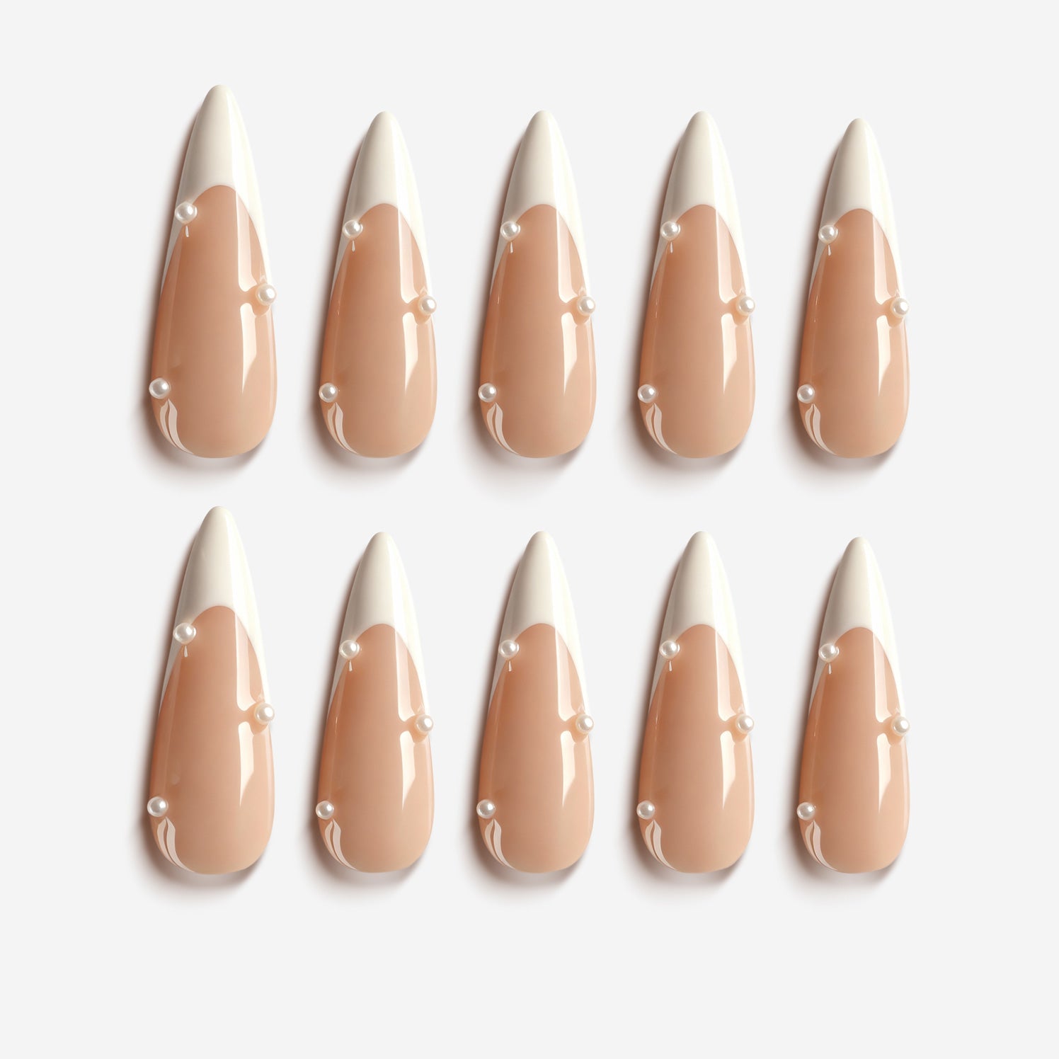 Nude shimmer press on nails with silver sparkle. Elegant everyday manicure set.