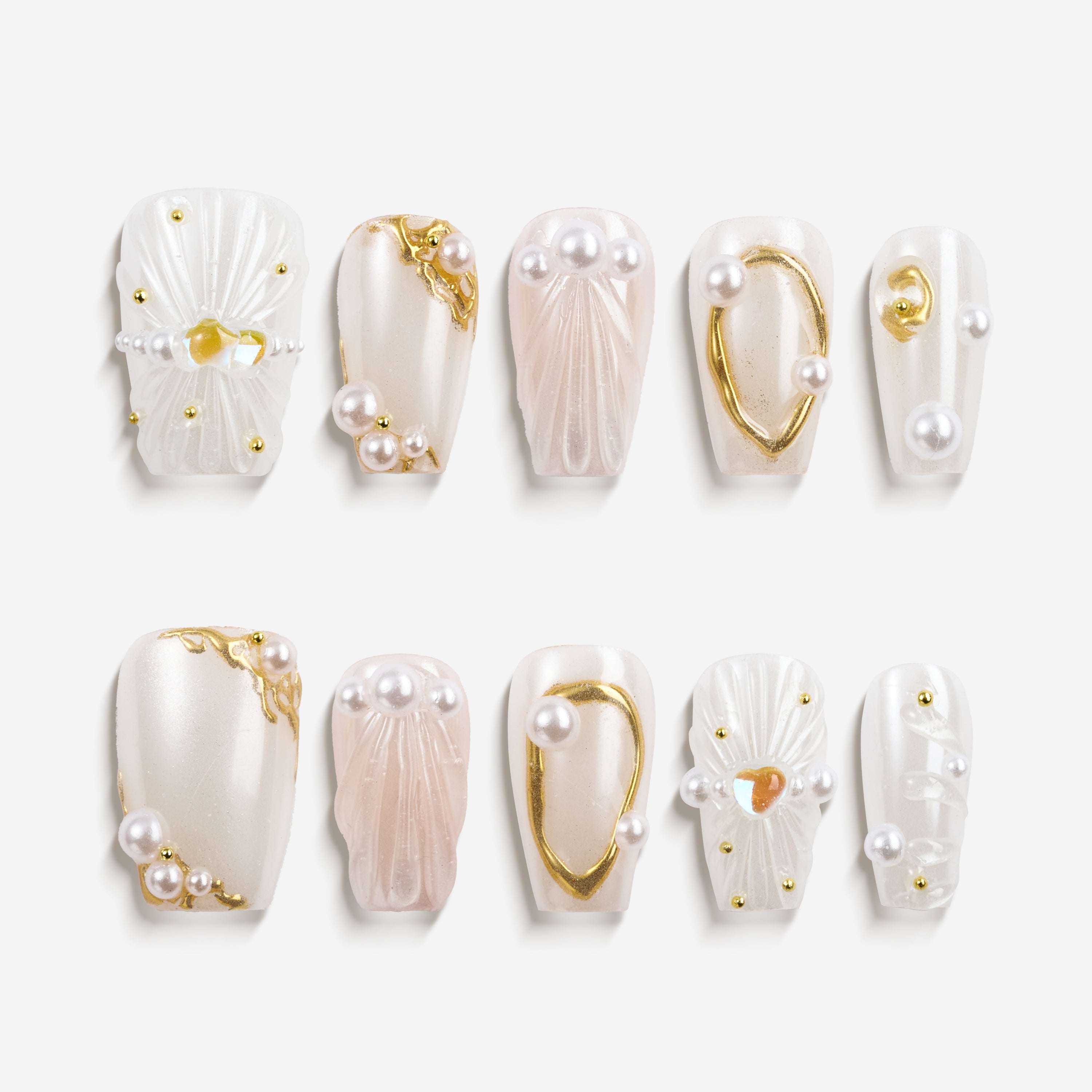 Pink ombre glitter press on nails with opalescent crystal detailing. Romantic sparkle and reusable design.