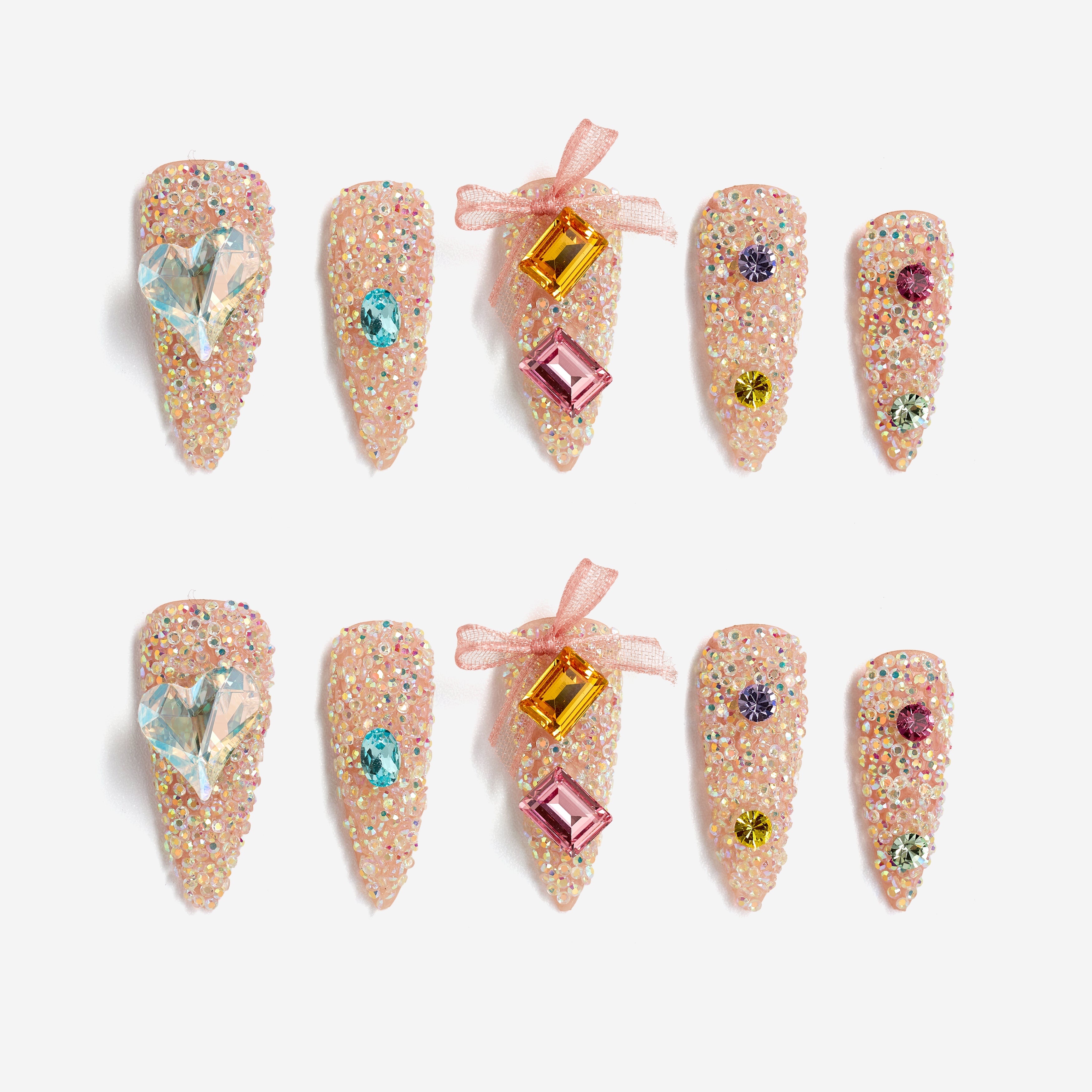 Almond luxury press on nails featuring genuine Swarovski® crystals. Handmade reusable high-shine nail set.