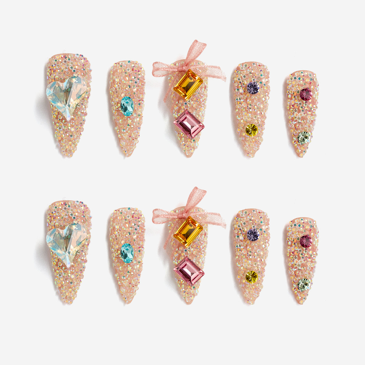 Almond luxury press on nails featuring genuine Swarovski® crystals. Handmade reusable high-shine nail set.