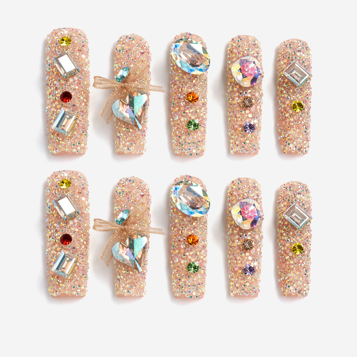 Luxury press on nails featuring genuine Swarovski® crystals. High-shine glam reusable nail art set.