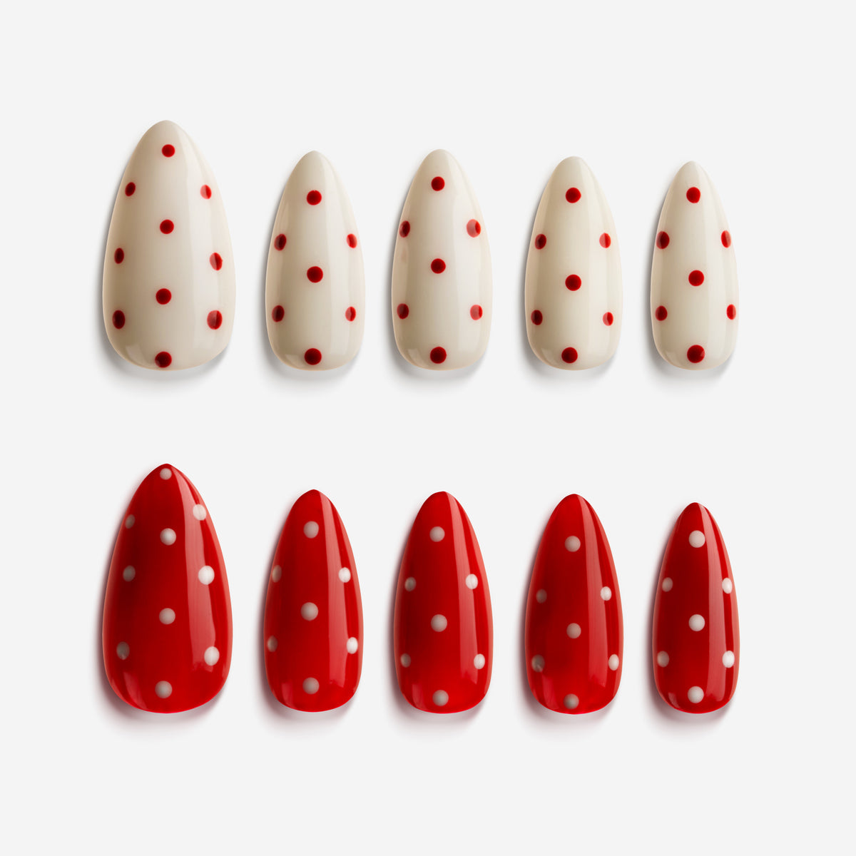 Color-mix polka dot press on nails in red, pink, and nude for playful nail art