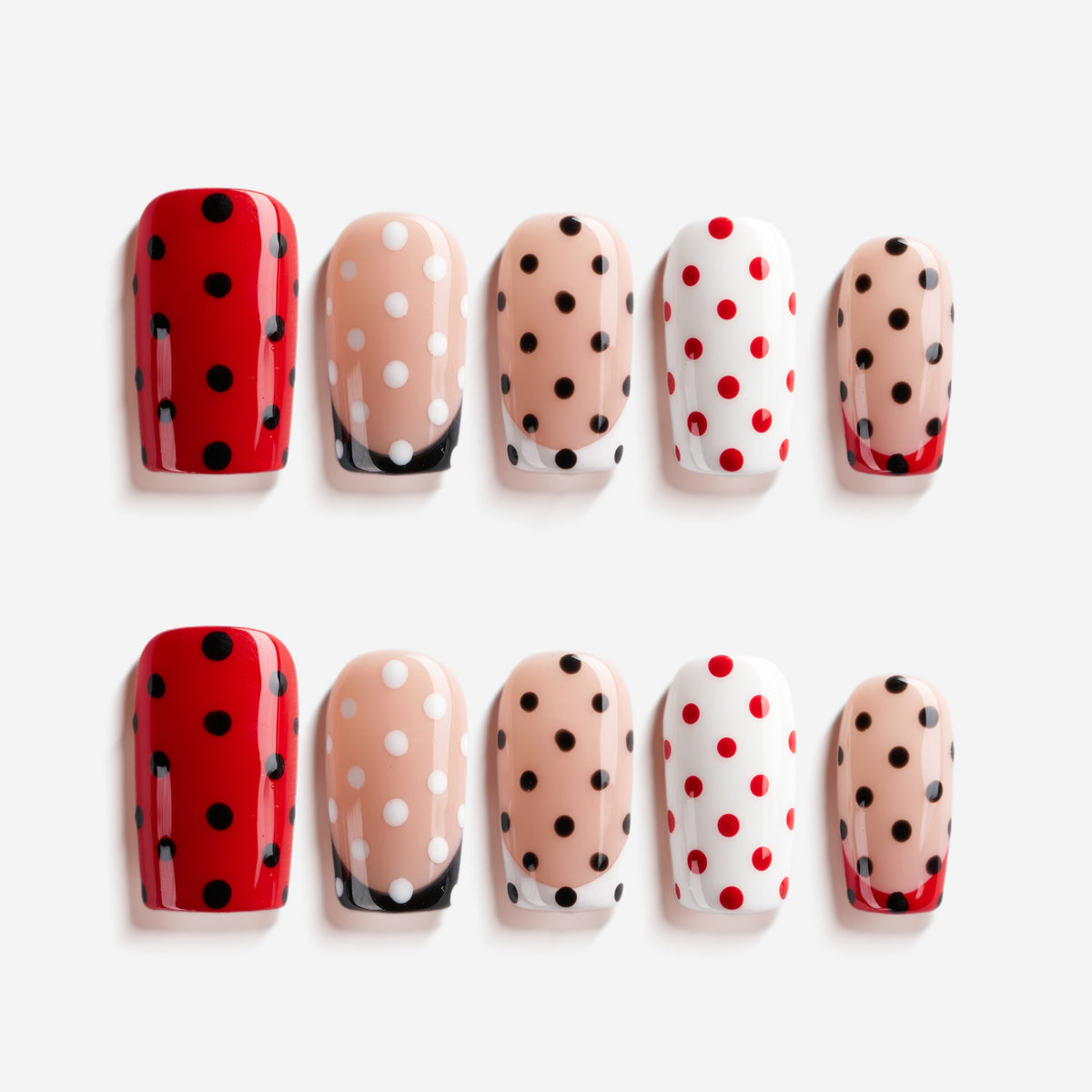 Retro polka dot press on nails in red, nude and white. Fun everyday manicure set.