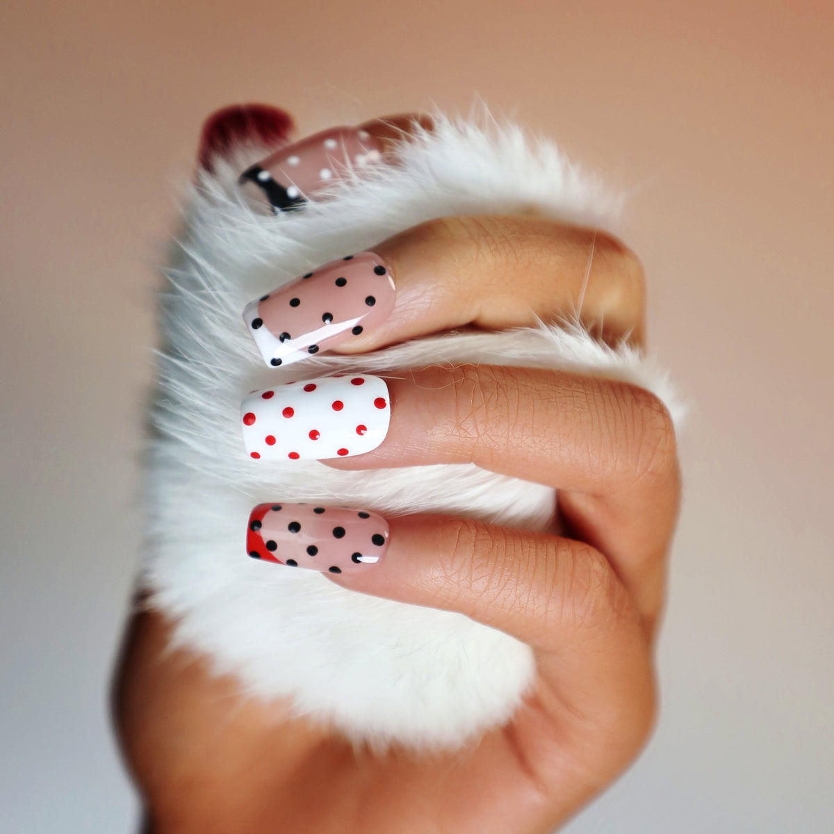 Retro polka dot press on nails in red, nude and white. Fun everyday manicure set.
