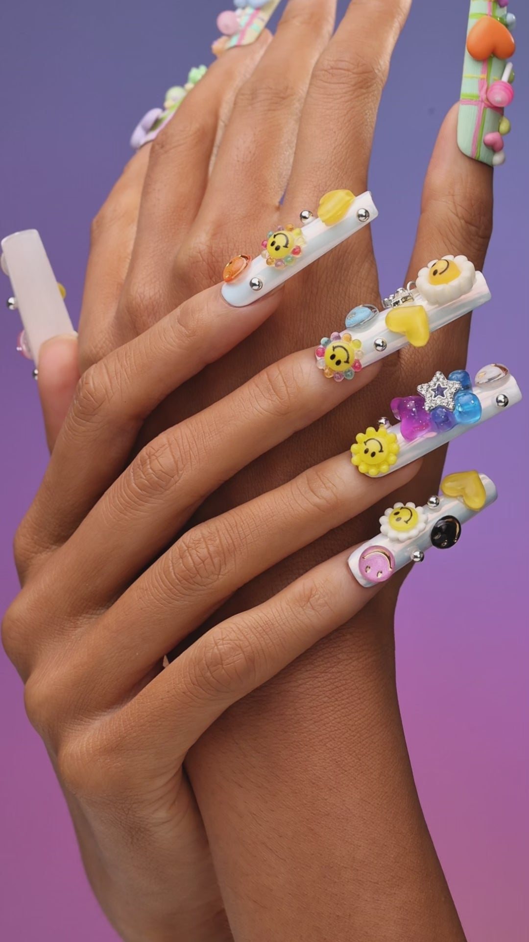 Colorful smiley face 3D press on nails in playful Y2K style. Reusable handmade nail art set.