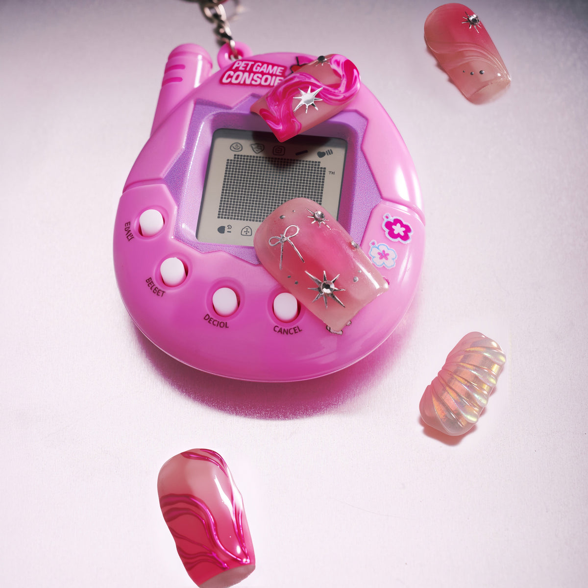 Radiant Sheen press on nails in square shape with pink glow and silver accents