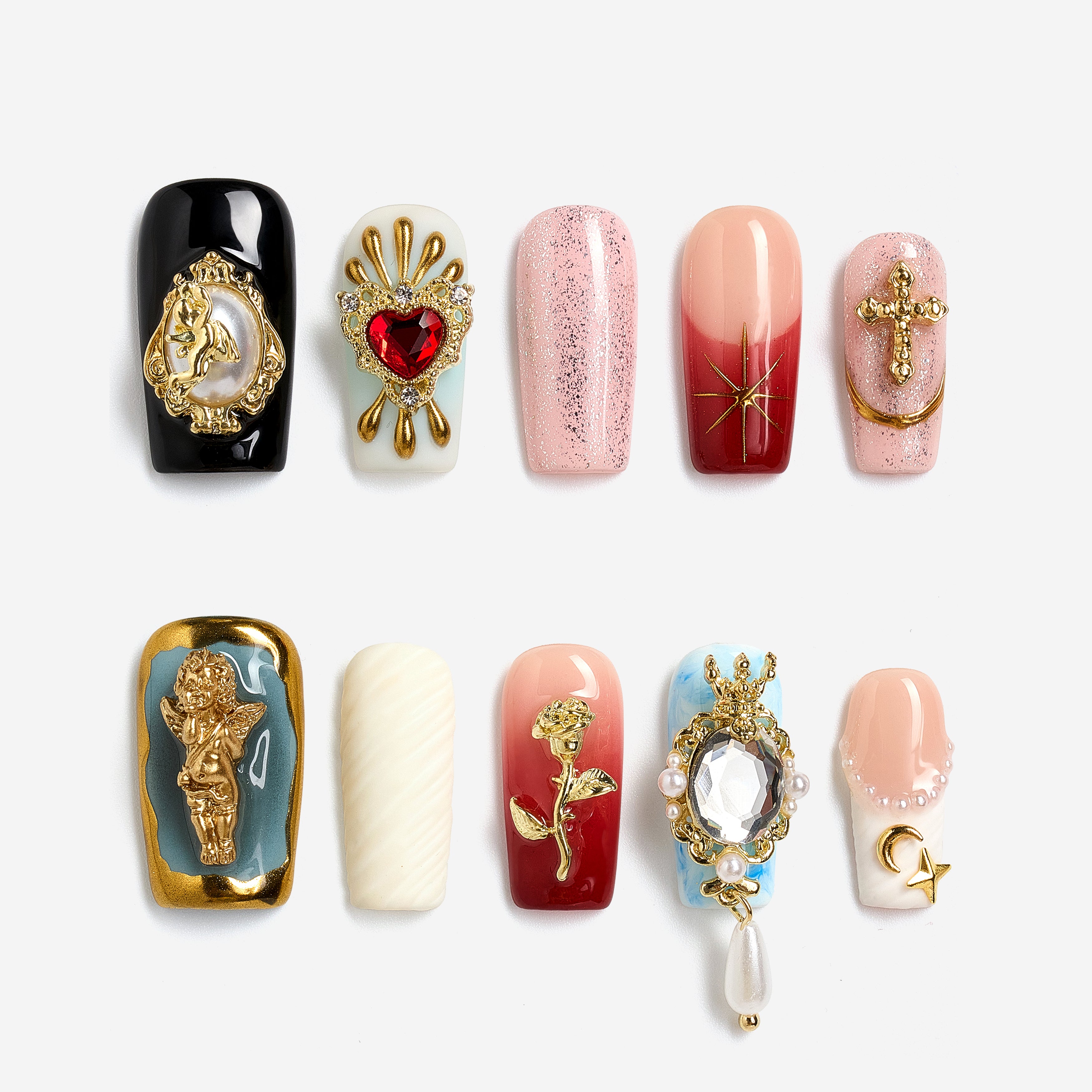 Baroque-inspired luxury press on nails with ornate gold accents and sacred heart details.