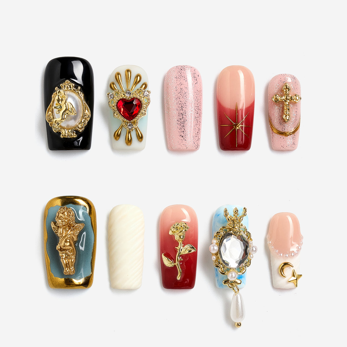 Baroque-inspired luxury press on nails with ornate gold accents and sacred heart details.