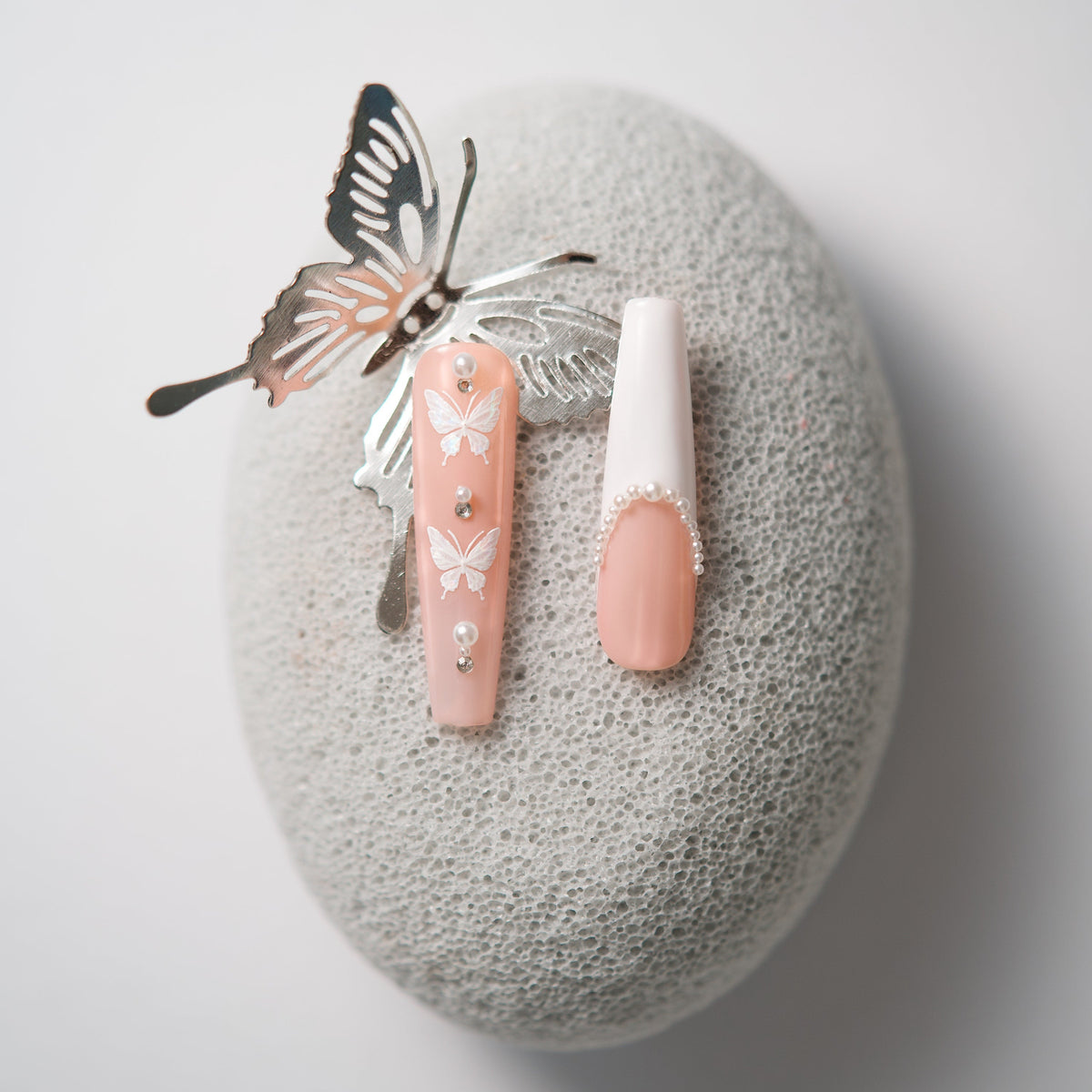 Blush pink ombre press on nails with crystal curves and floral detail. Soft romantic and reusable.