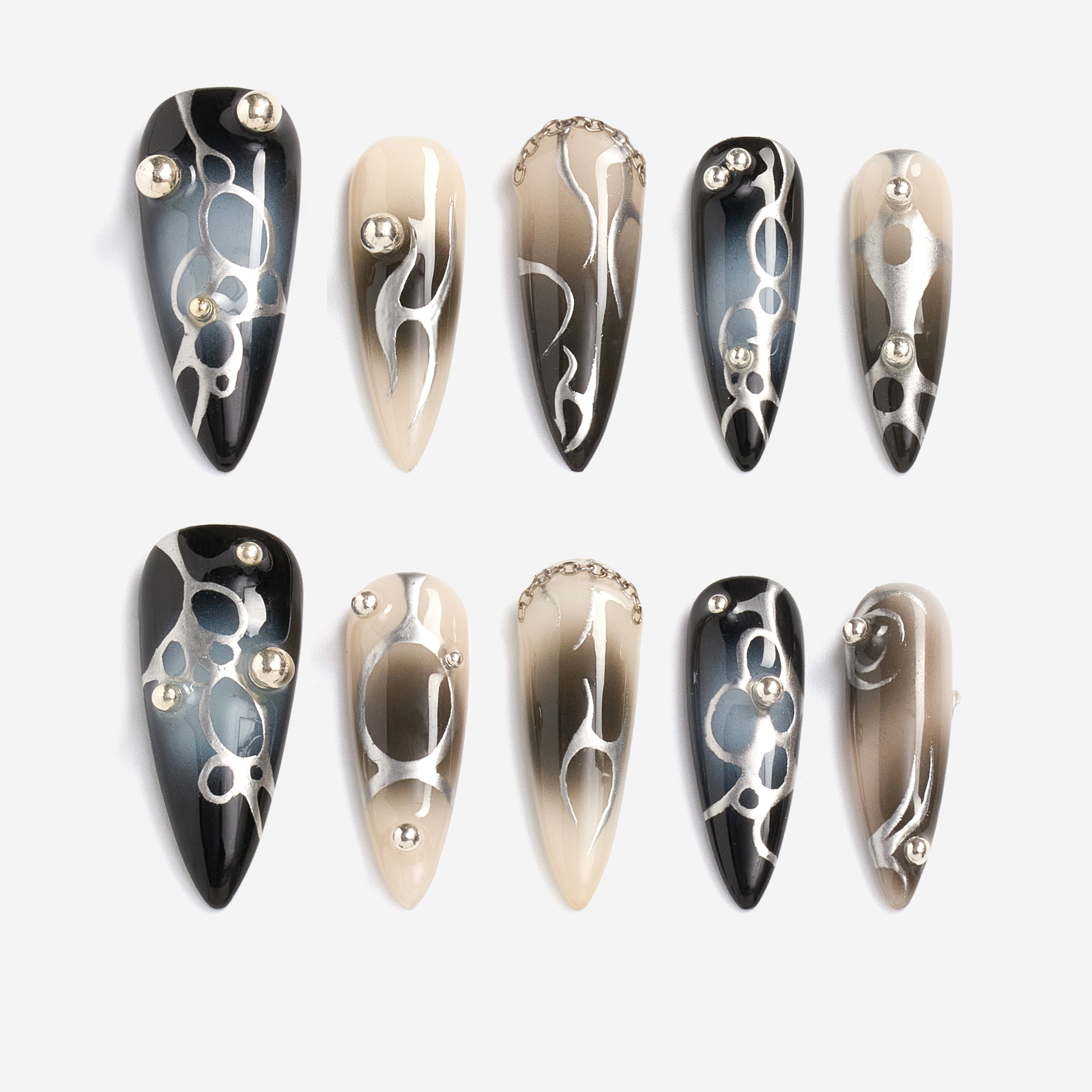 Shadowy Fantasy Vein press-on nails with black-to-blue ombré, metallic chains, and gothic cross embellishments