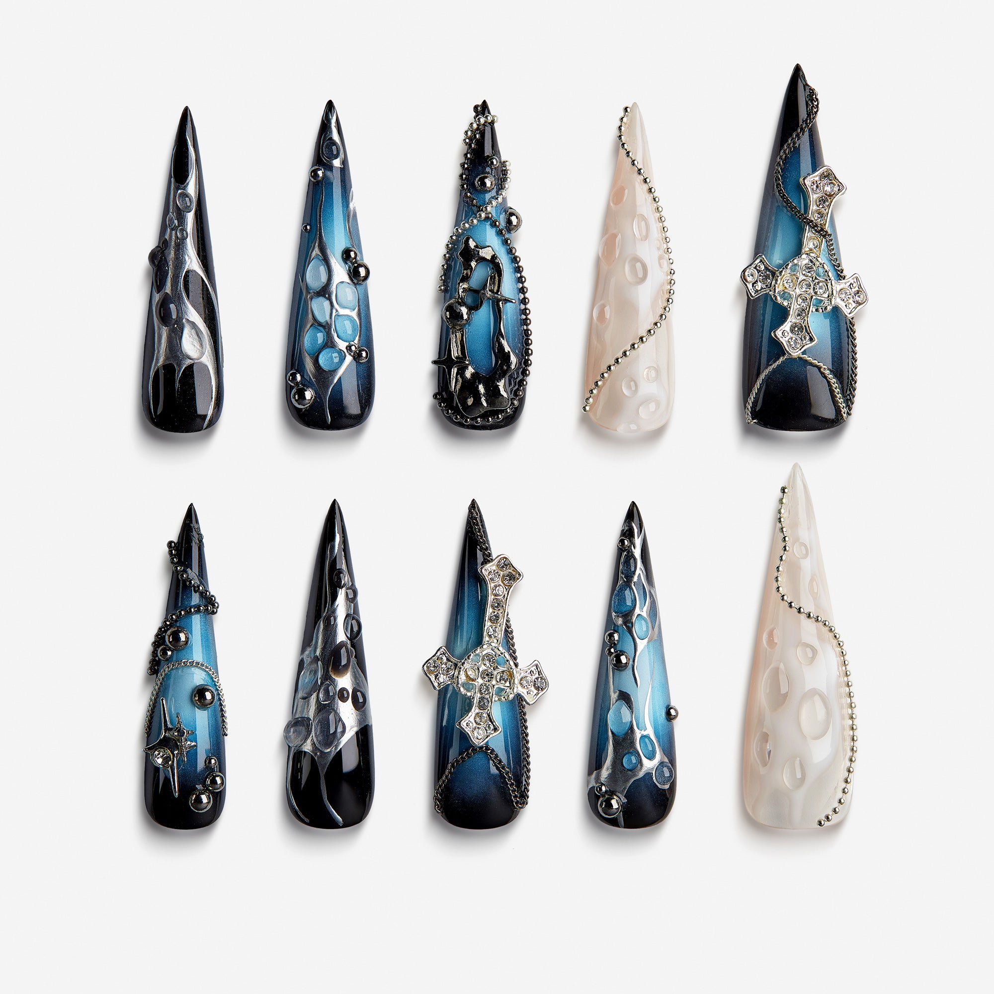 Shadowy Fantasy Vein press-on nails with black-to-blue ombré, metallic chains, and gothic cross embellishments