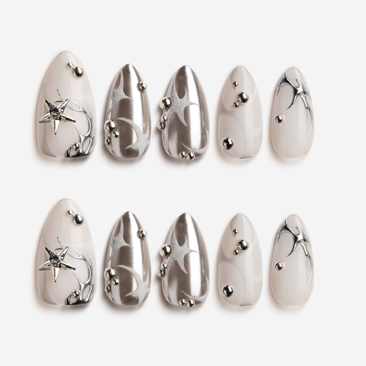 Silver Mystique metallic press on nails with abstract chrome textures.
