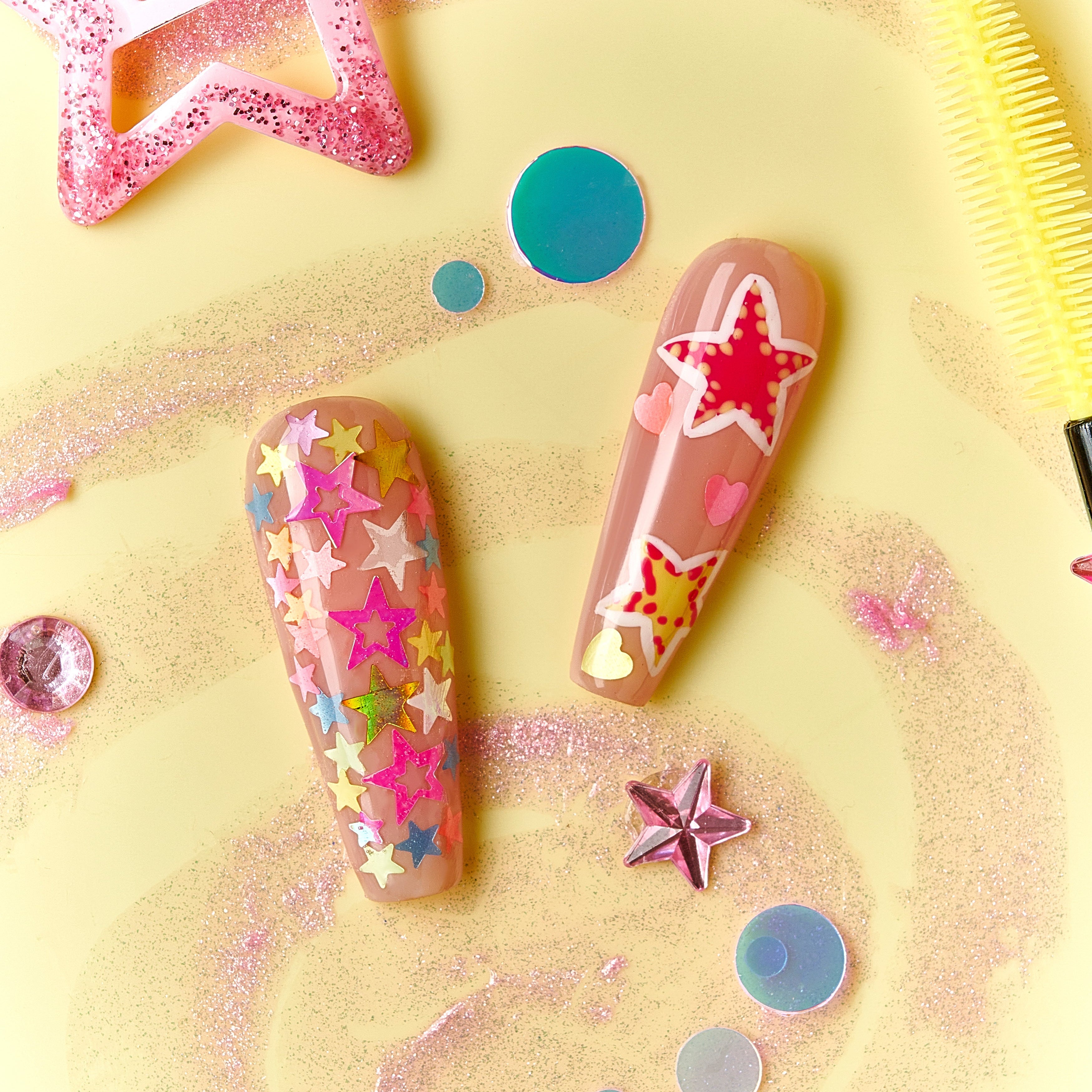 Starry Dream gradient press on nails with colorful star patterns and swirl details.