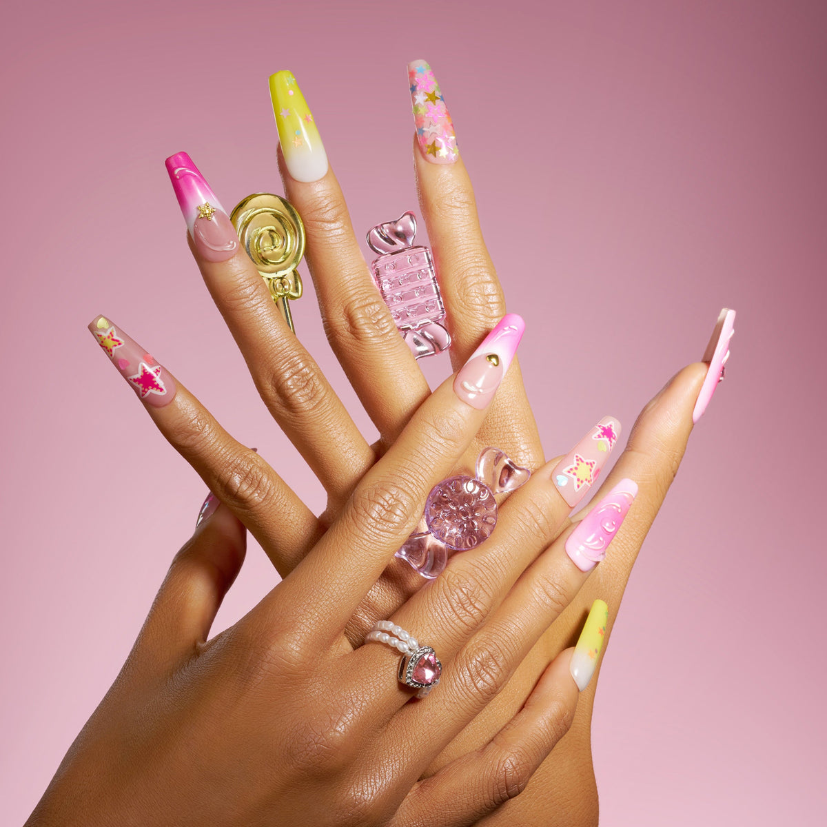 Starry Dream gradient press on nails with colorful star patterns and swirl details.