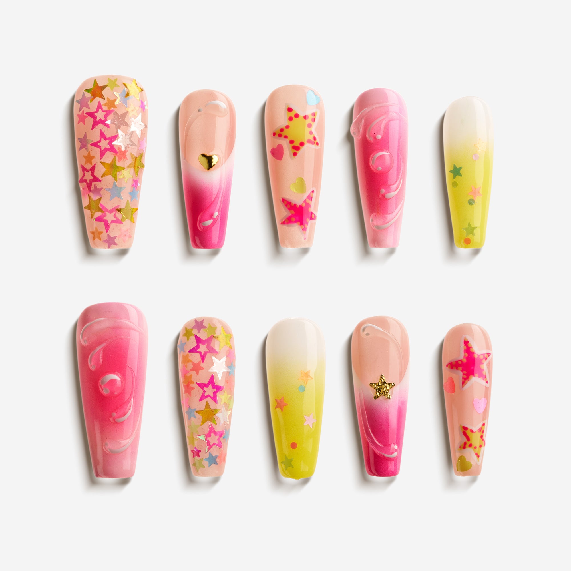 Starry Dream gradient press on nails with colorful star patterns and swirl details.