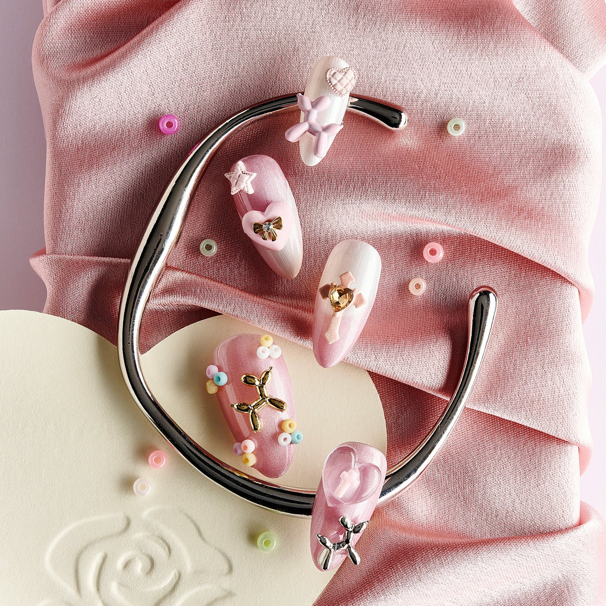 Pastel handmade press on nails with soft tones and 3D details. Reusable nail art set for everyday elegance.